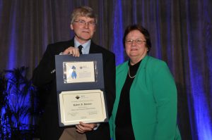 Director Hamers receiving the ACS Fellow award from Diane Grob Schmidt (photo by Peter Cutts Photography)
